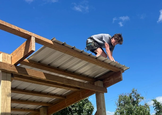 lakay team working on structure roof