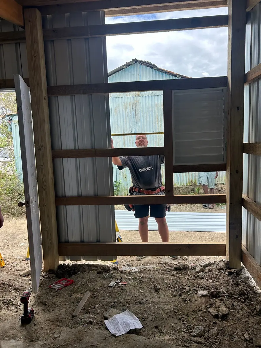lakay worker outside structure