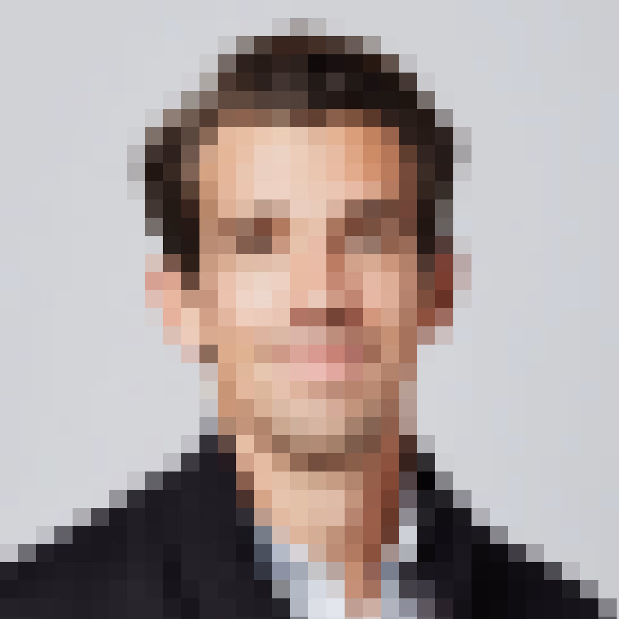 Pixelated portrait of a man with short brown hair wearing a dark blazer and light shirt.