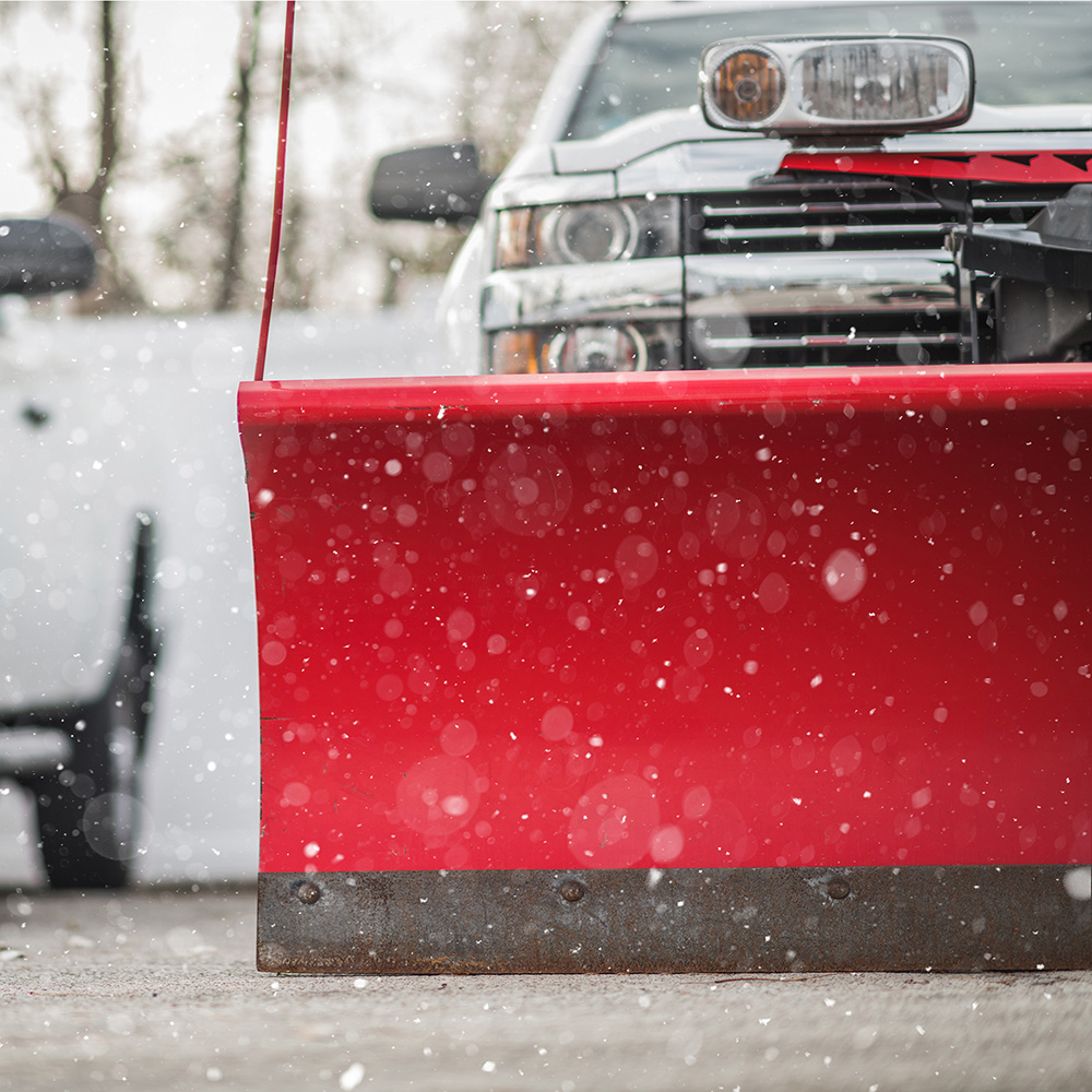 commercial snow plowing services near me for parking lots and properties