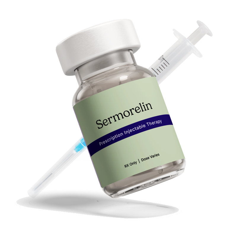 Close-up of a syringe behind a glass medical vial with a label featuring a white RoarMD's logo and a white cap.