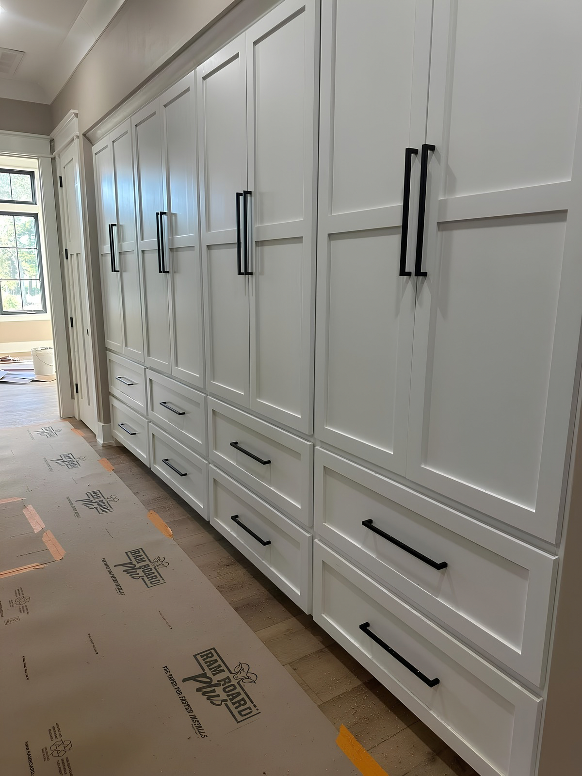 Two-story stone home with newly installed asphalt roof in Southlake TX