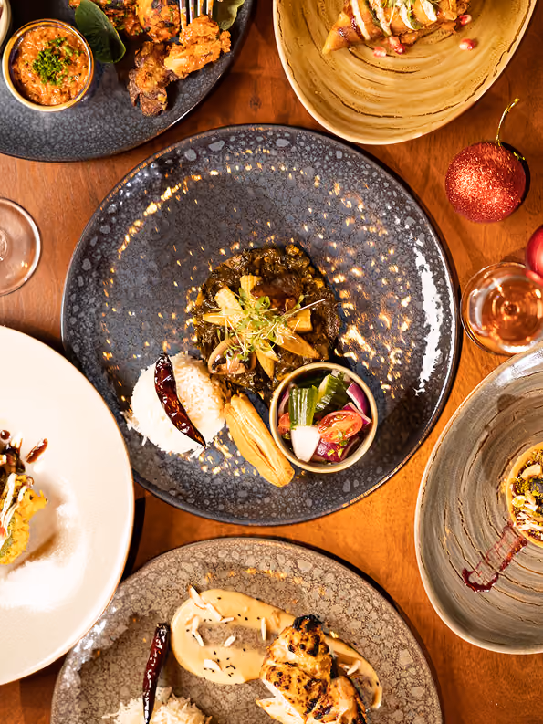 A spread of regional Indian dishes at Doolally