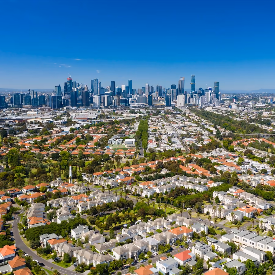View of North Shore suburbs near Albany with Auckland city in the distance.