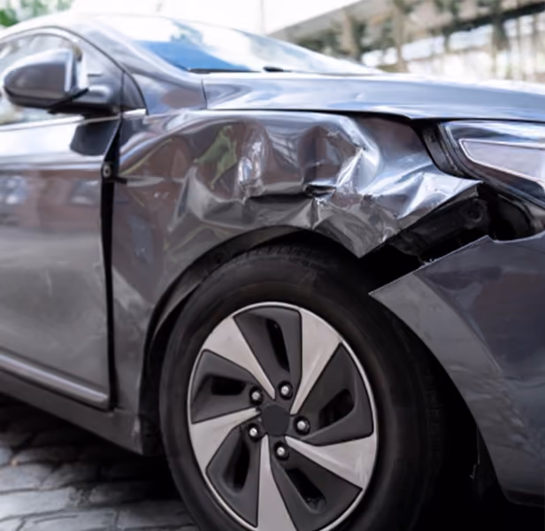 Toyota car with visible panel damage ready for assessment.