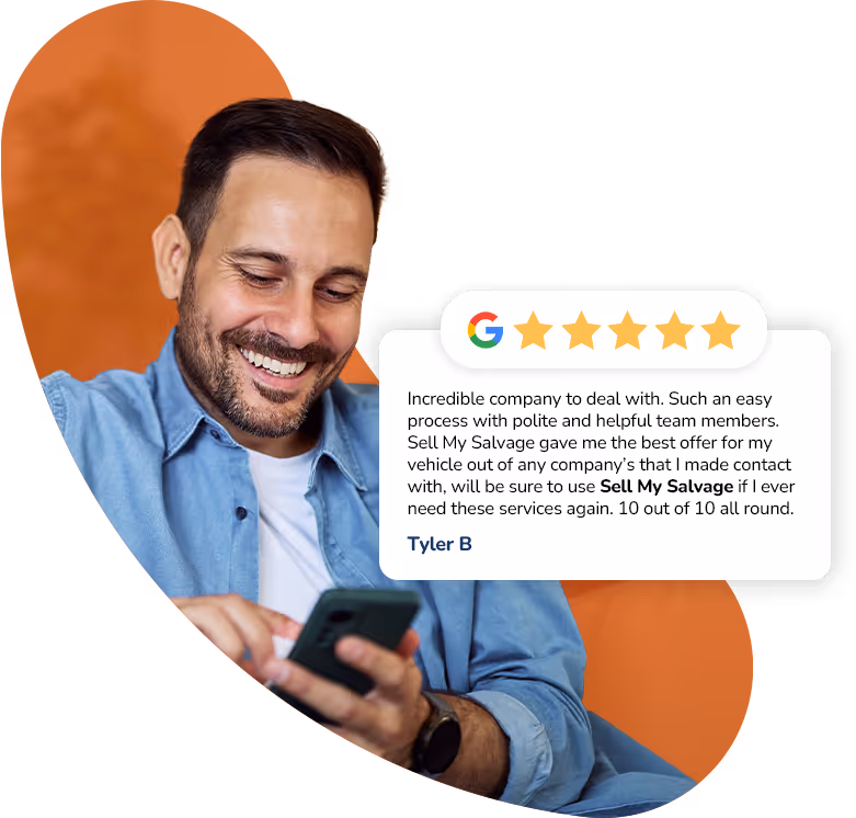 A smiling man in a blue shirt looks down at his phone while sitting against an abstract orange background. Next to him is a review card with a Google 5-star rating and a testimonial praising “Sell My Salvage” for an easy process, helpful team, and offering the best price, signed by Tyler B.