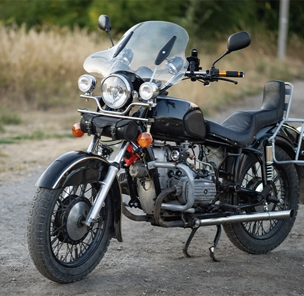 Motorbike parked on roadside ready to be sold for cash.