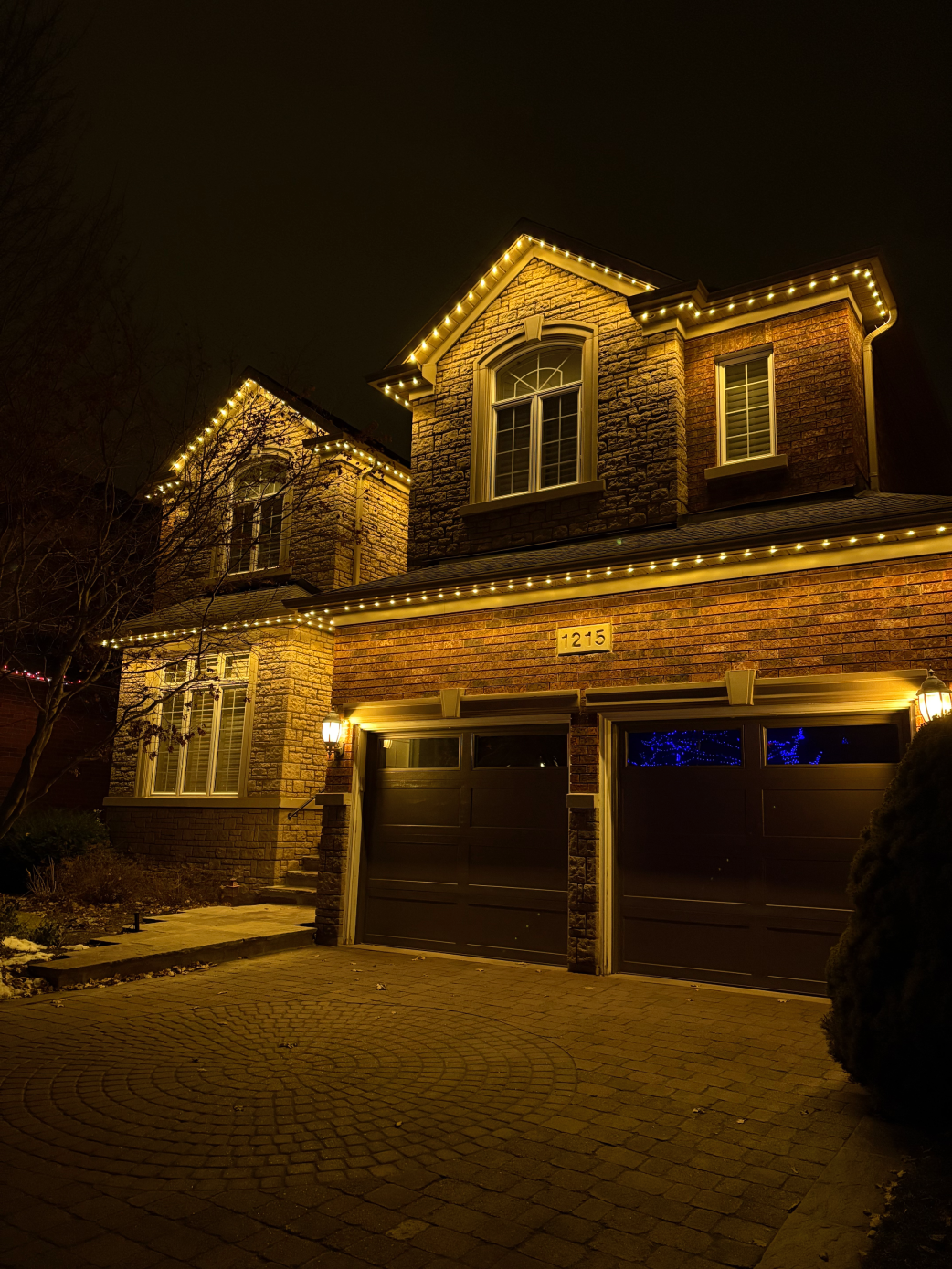 Warm white permanent LED soffit lighting installed on modern two-storey home by RoyalShine Lighting in the Greater Toronto Area, creating a clean and elegant exterior lighting look at night