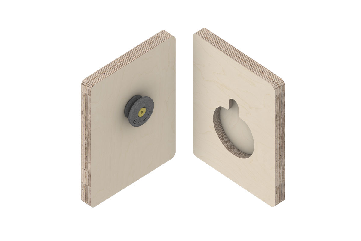 Two wooden blocks with a close up of the XF010 Clip System. On the left block a XF010-M Clip is screwed on to the block. On the right block a CNC cut out shape for the clip to slot on.