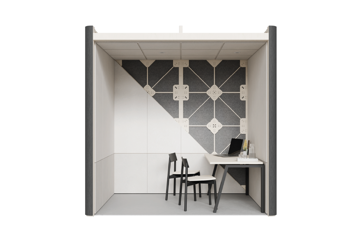 An interior look into a Quiet Room, with a diagonal split showing XFrame panels against the back wall, and savoye PET interior linings and a desk is against the right wall, with a laptop, plant, a jug of water and cups on the desk, and two chairs.