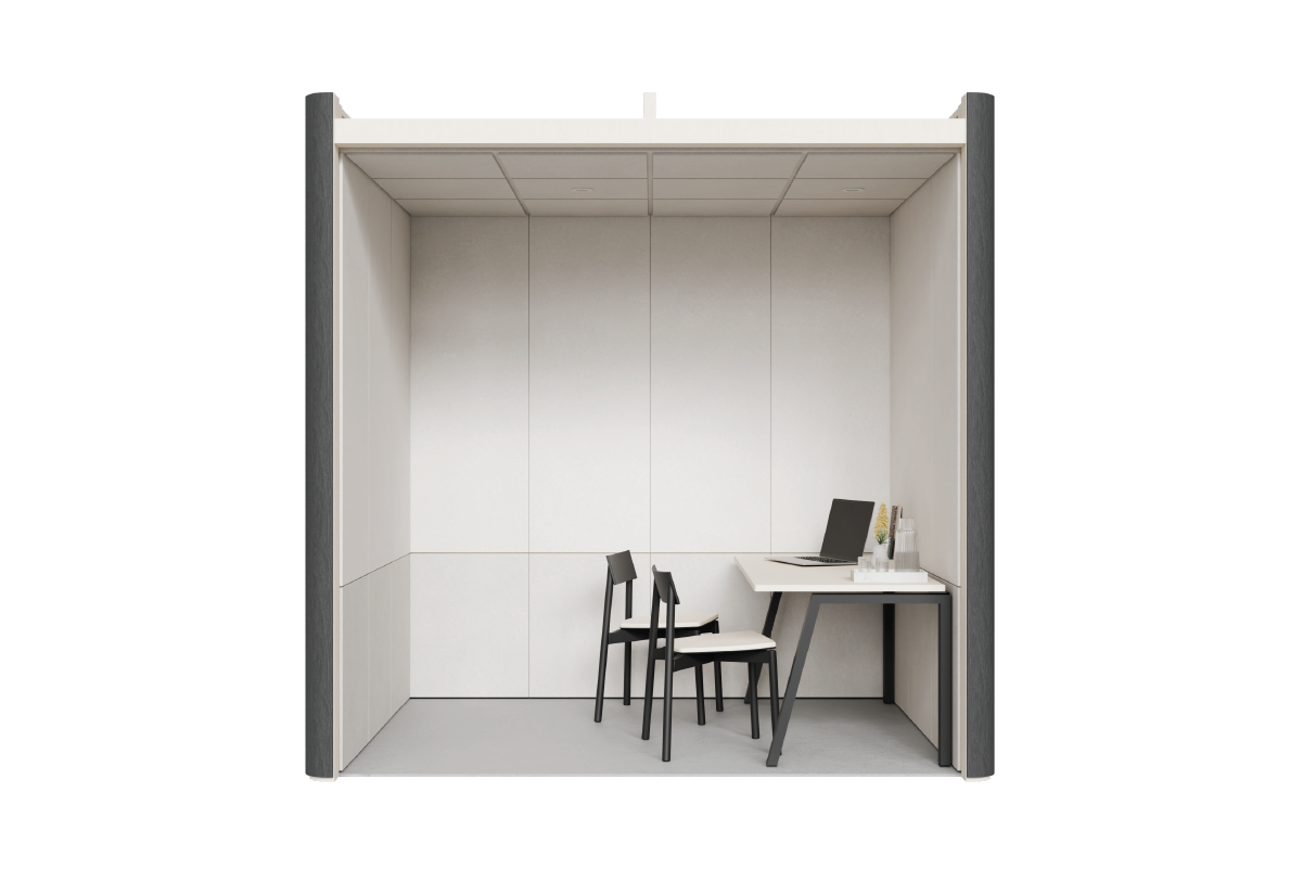 An interior look into a Quiet Room, with savoye PET interior linings and a desk against the right wall, with a laptop, plant, a jug of water and cups on the desk, and two chairs.