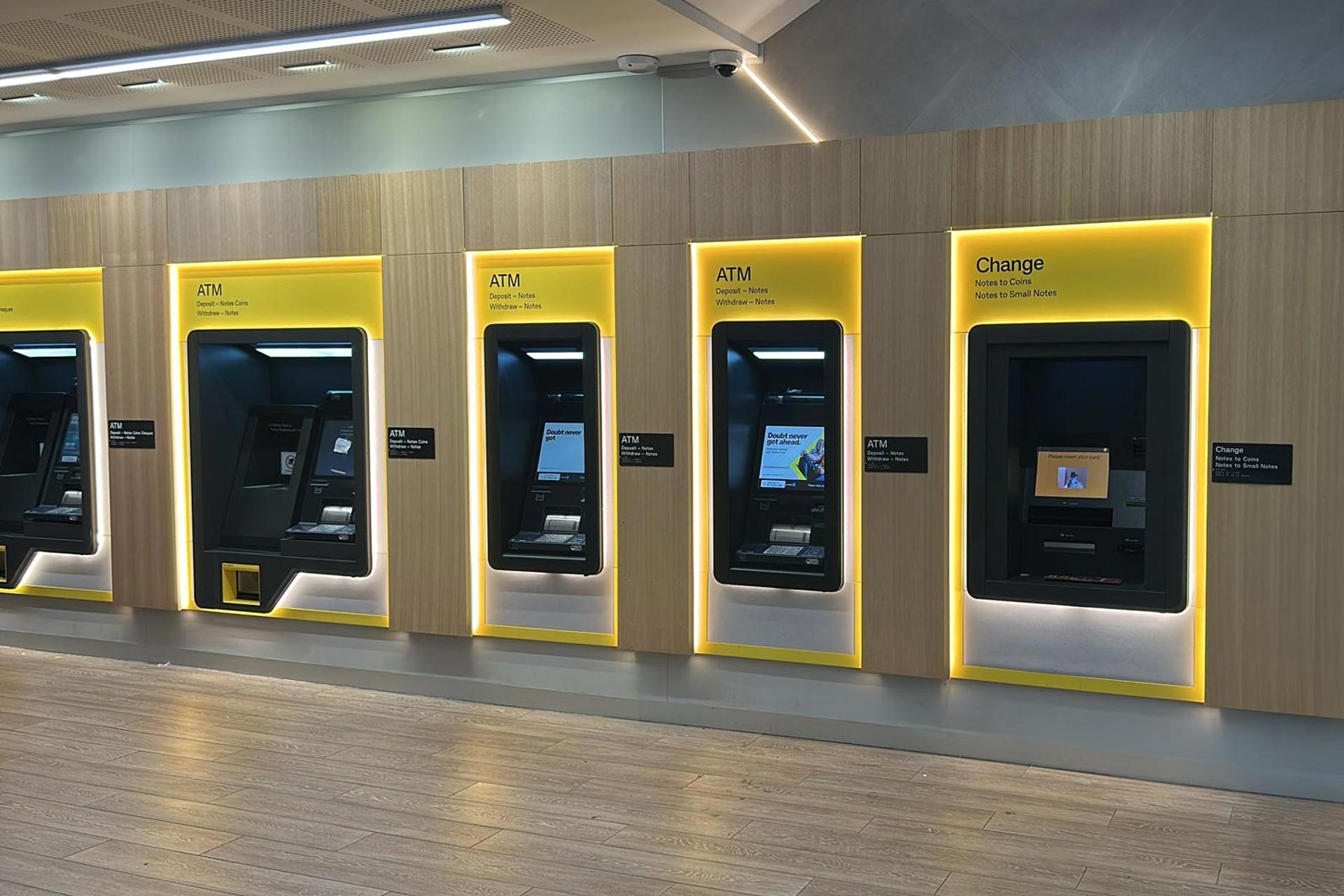 A line of CBA ATMs in a CBA store.