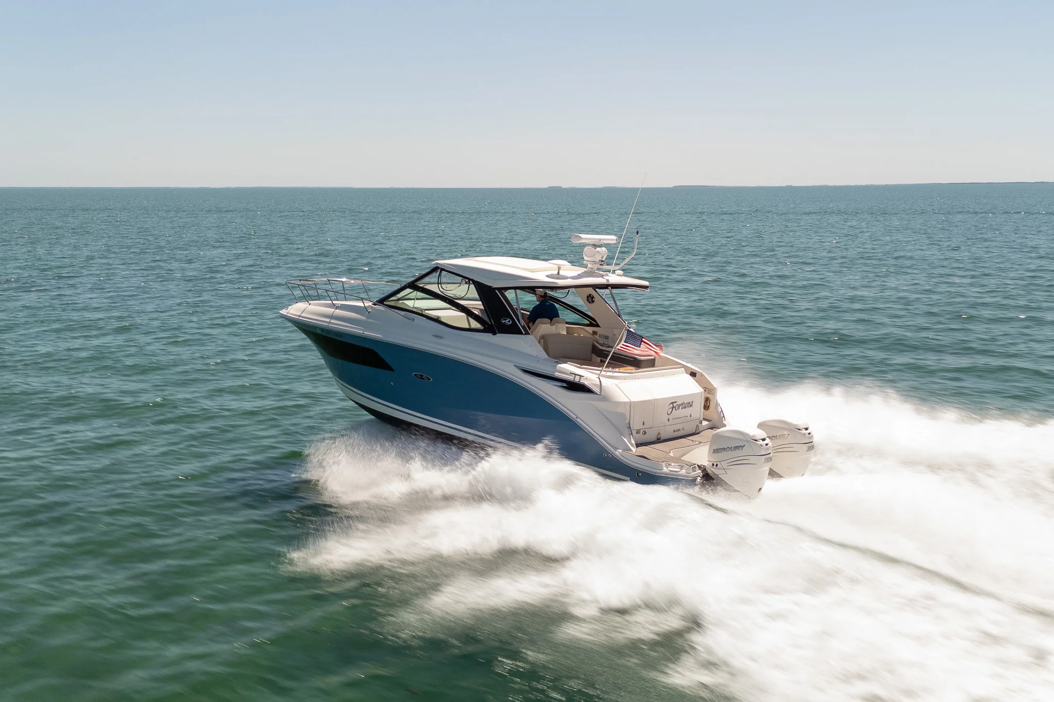 2020 Sea Ray 320 DA OB - running shot blue hull