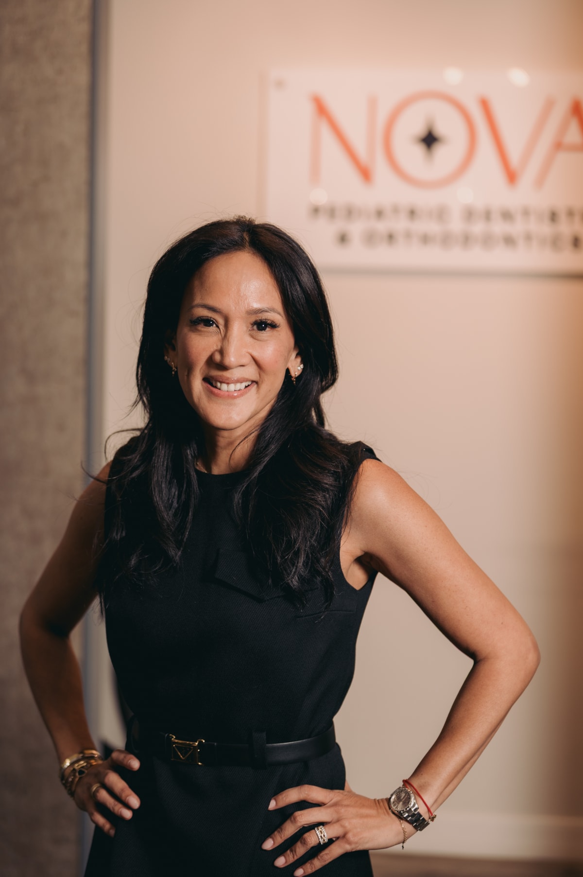 Female orthodontist smiling at Nova Pediatric Dentistry office