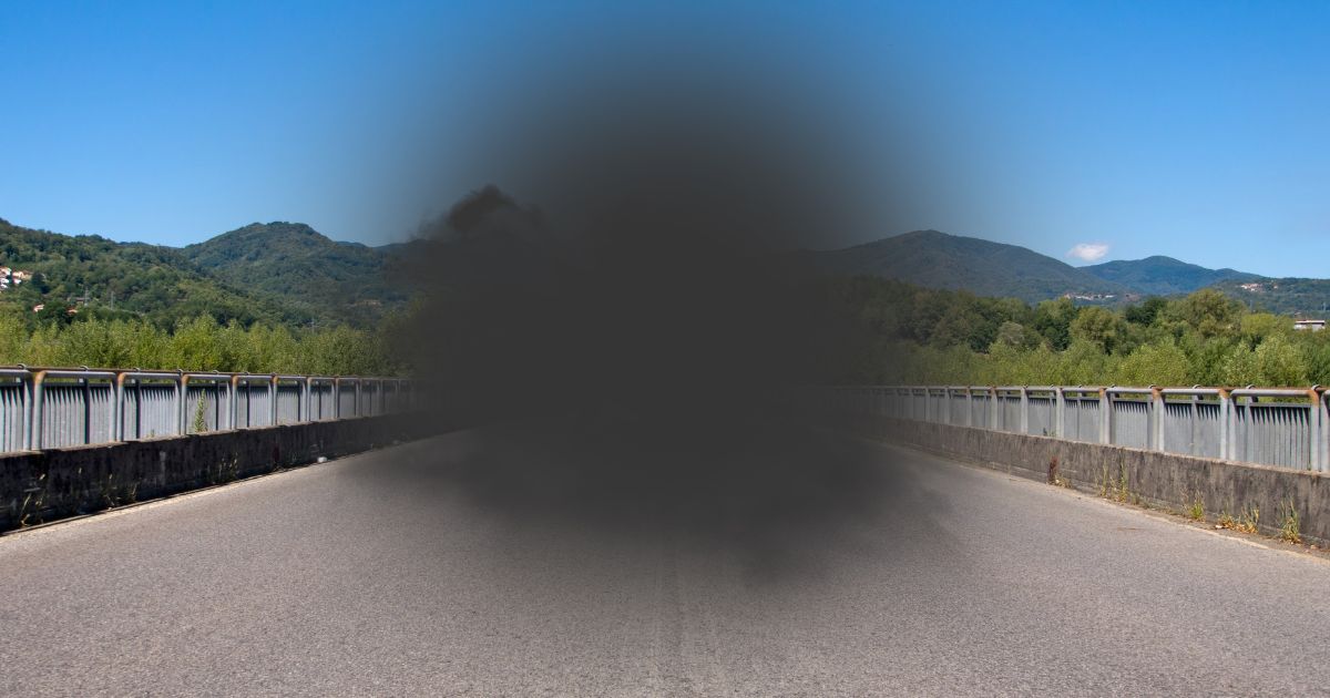 Road scene simulating central vision loss from macular degeneration.