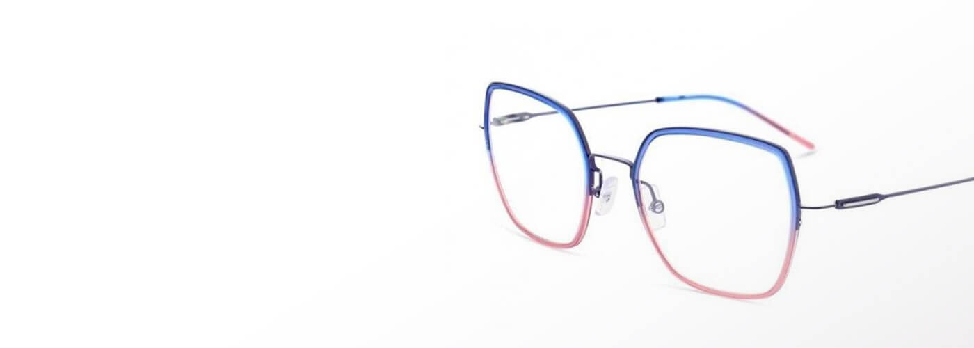 Blue to pink gradient oversized cat-eye metal glasses frames.