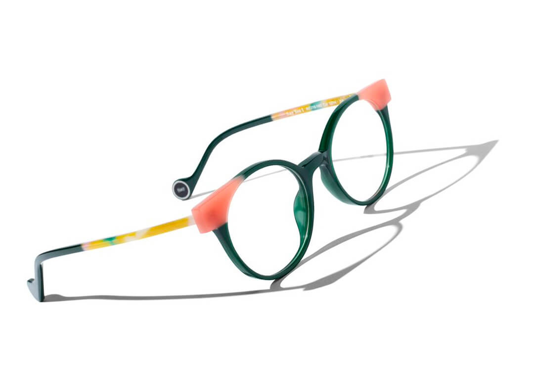 Round green glasses frames with orange and yellow accent details.
