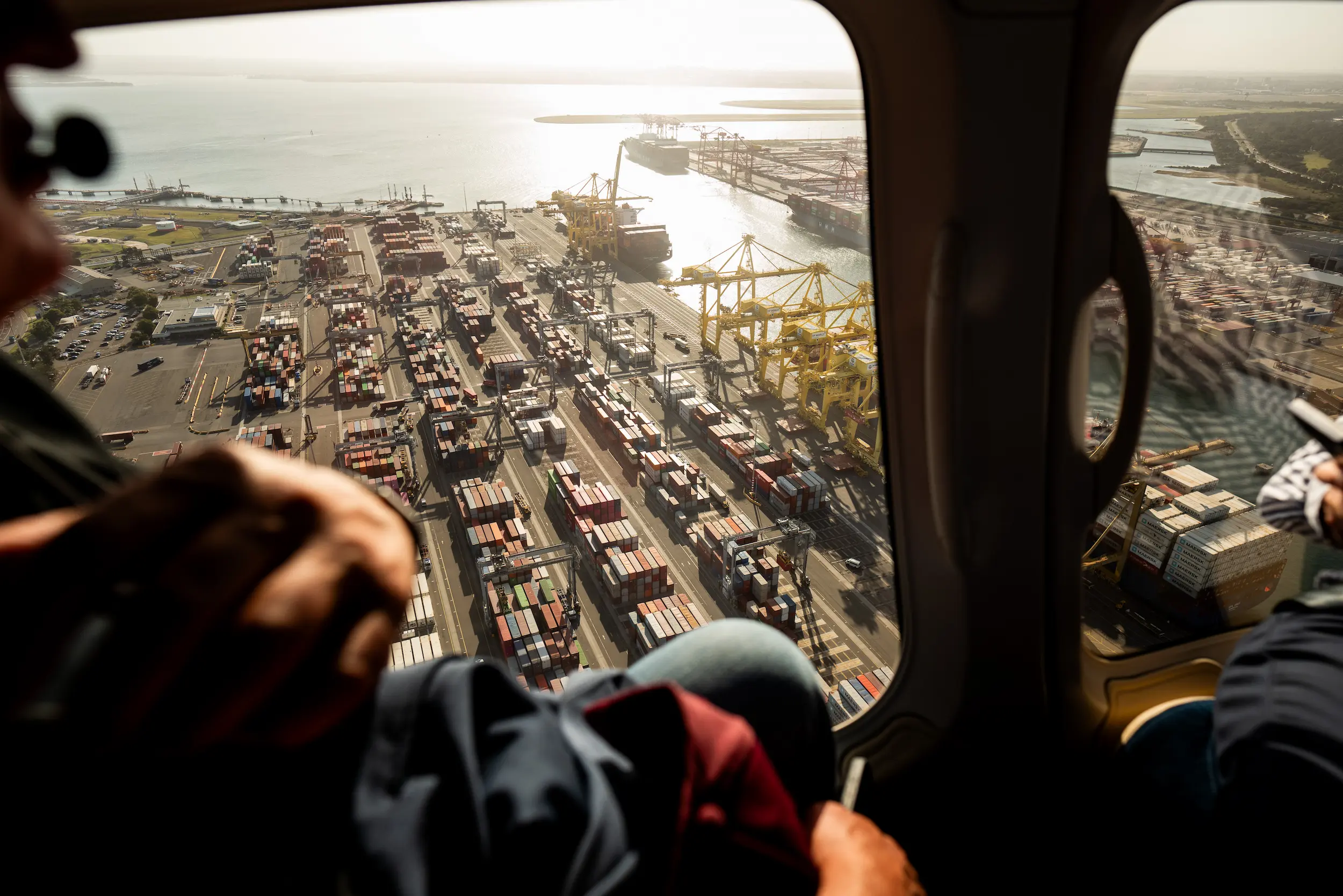 A view of a port from a plane window.