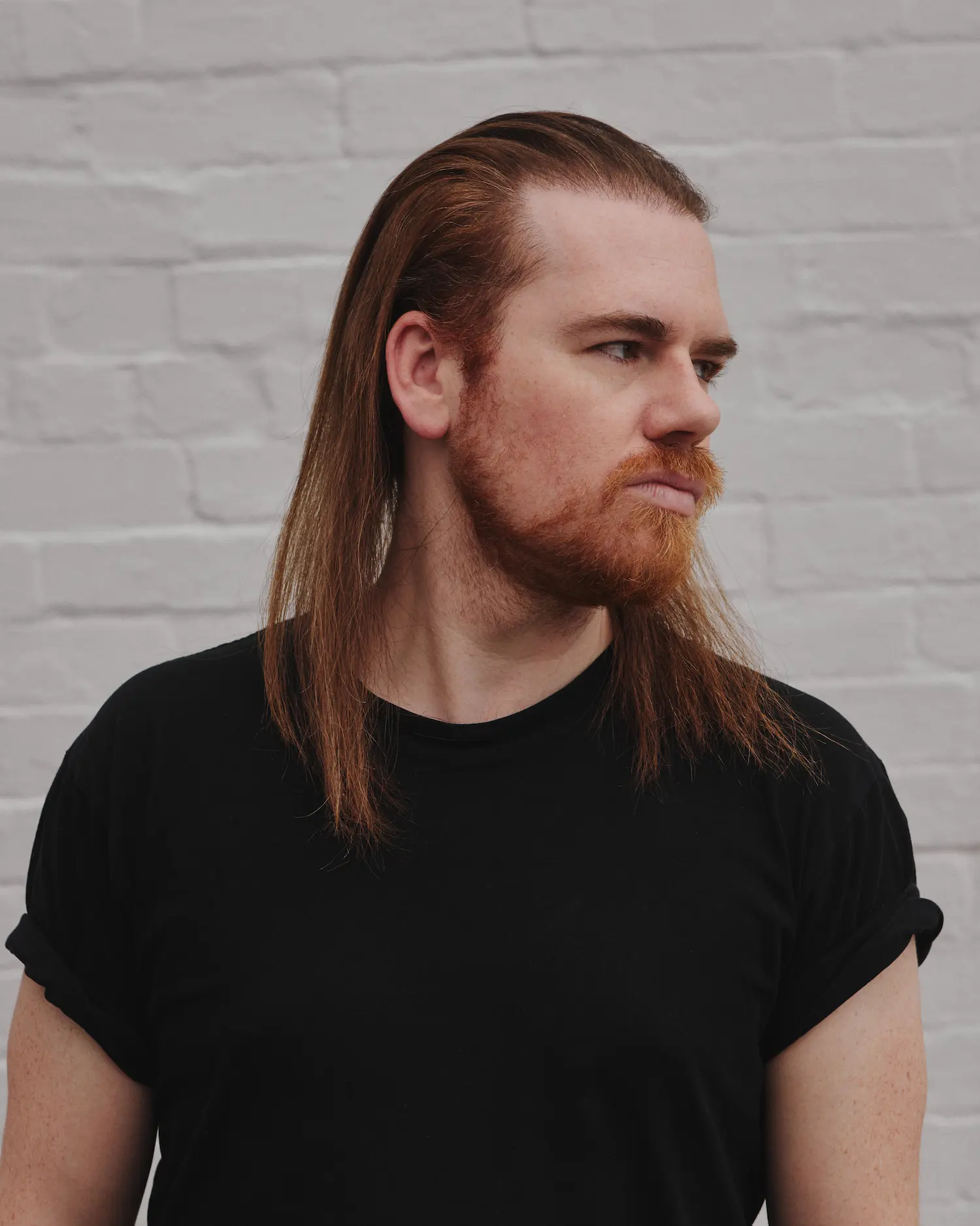 A man with long hair and a beard.