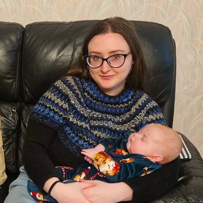 Clare holding a baby