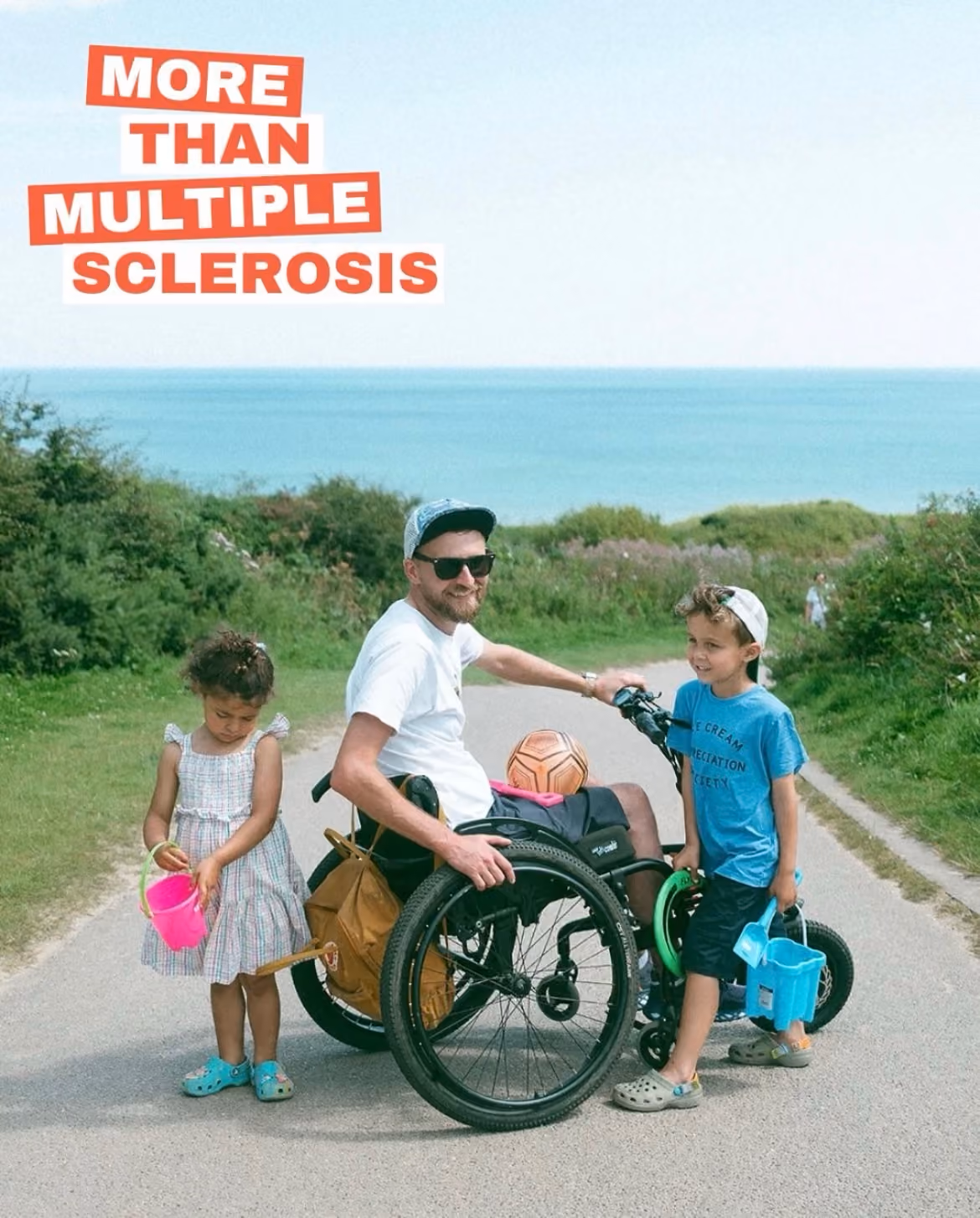 Nik with his two children overlooking the sea. Text reads, more than MS.