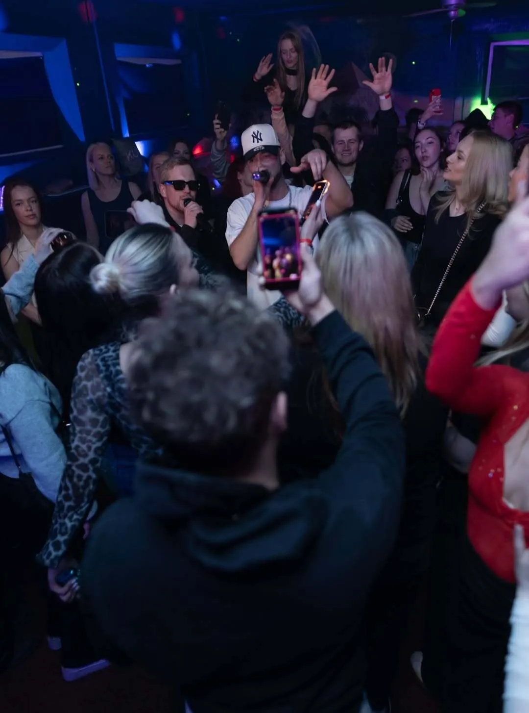 image of people in a cozy environment using a tablet