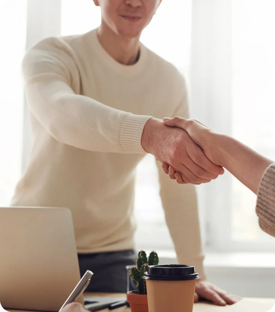 Two venture capitalist workers making a deal