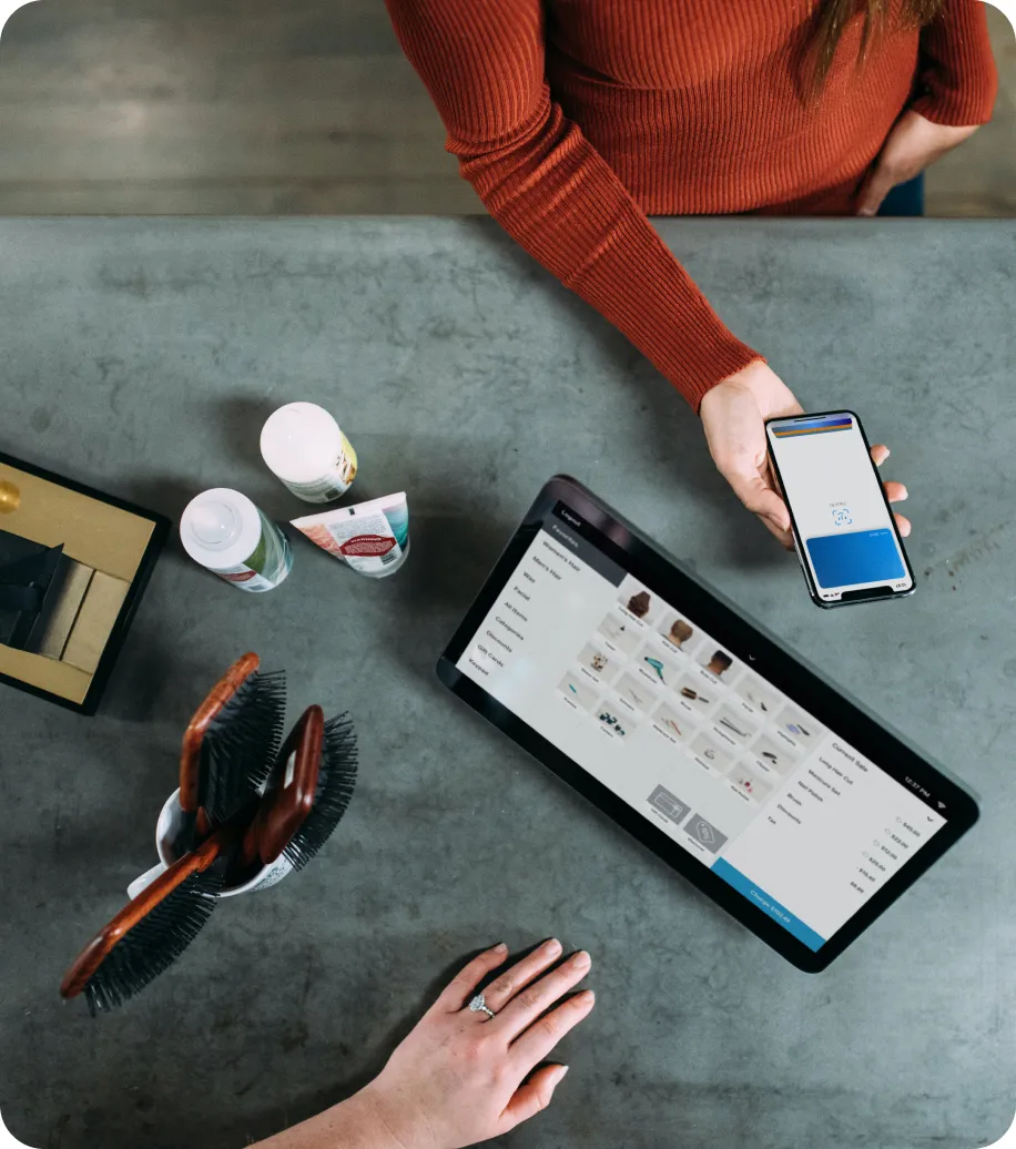 Woman purchasing something in a retail store
