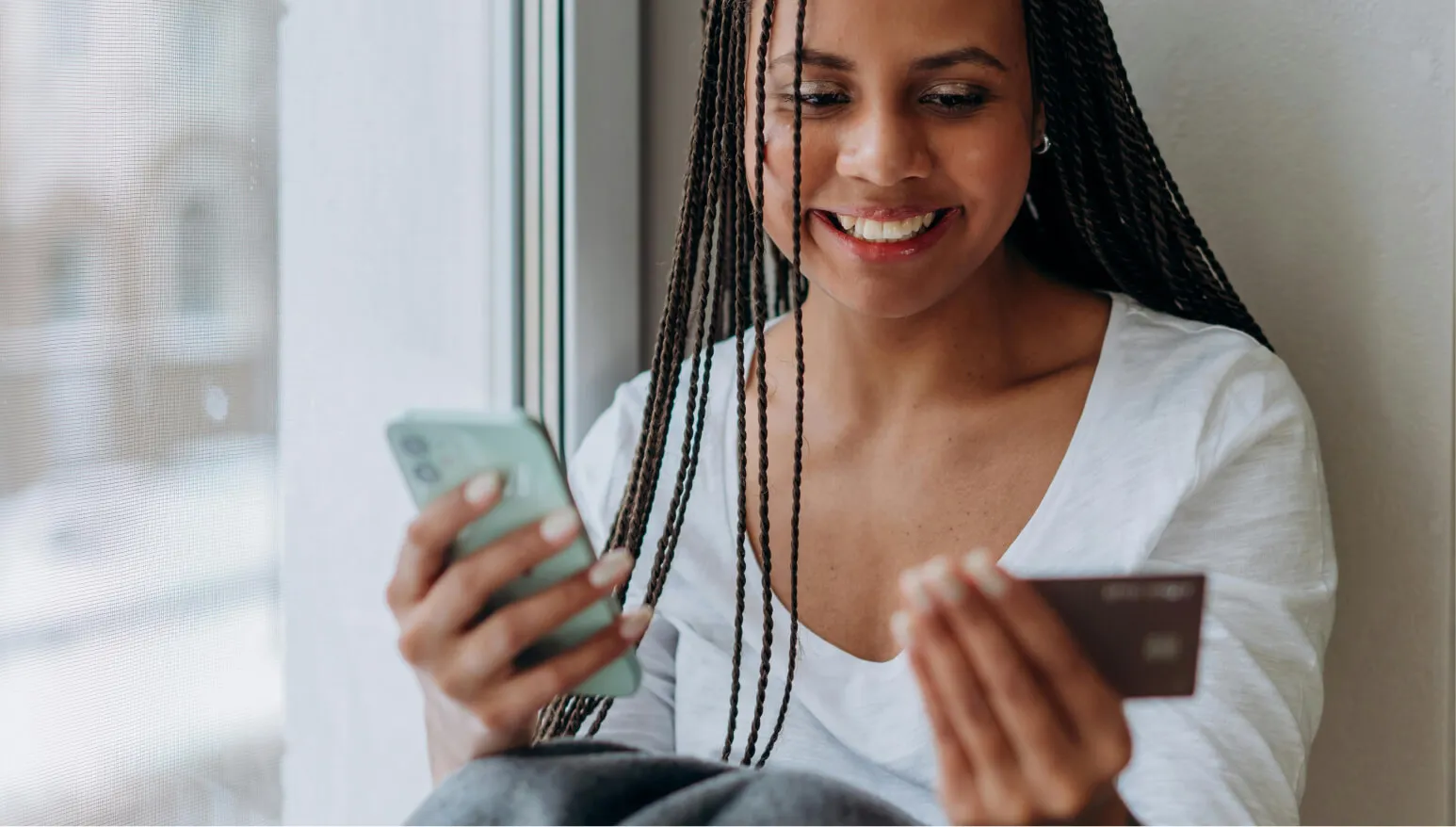 image of a women looking at the card details