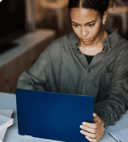 woman looking at a computer