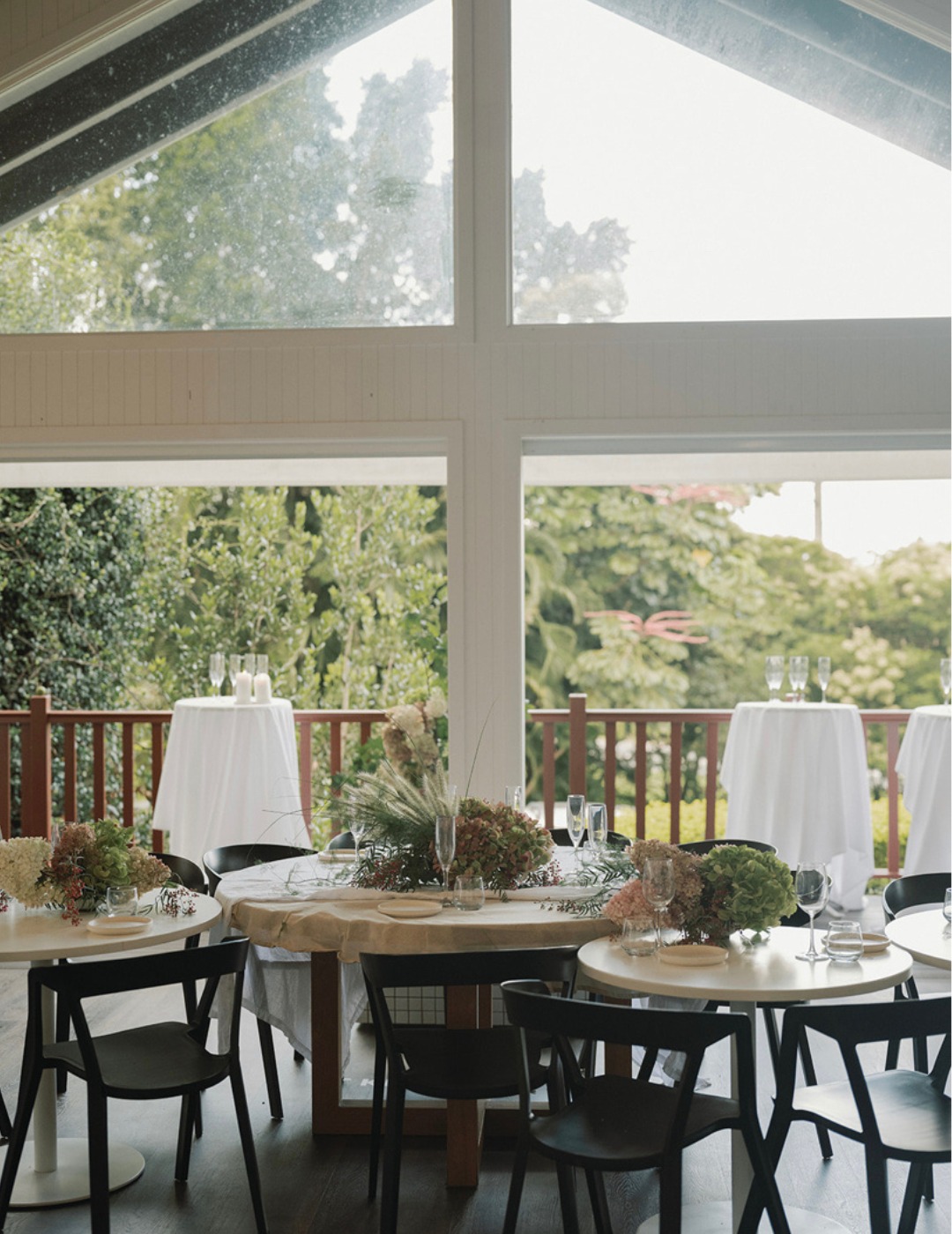 Couple dining on the outdoor deck at Greenhouse Canteen
