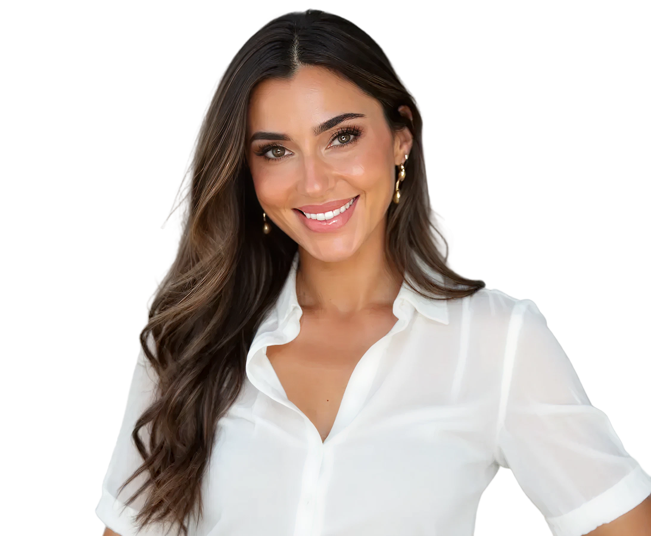 Smiling woman with long wavy brown hair wearing a white blouse and gold earrings.