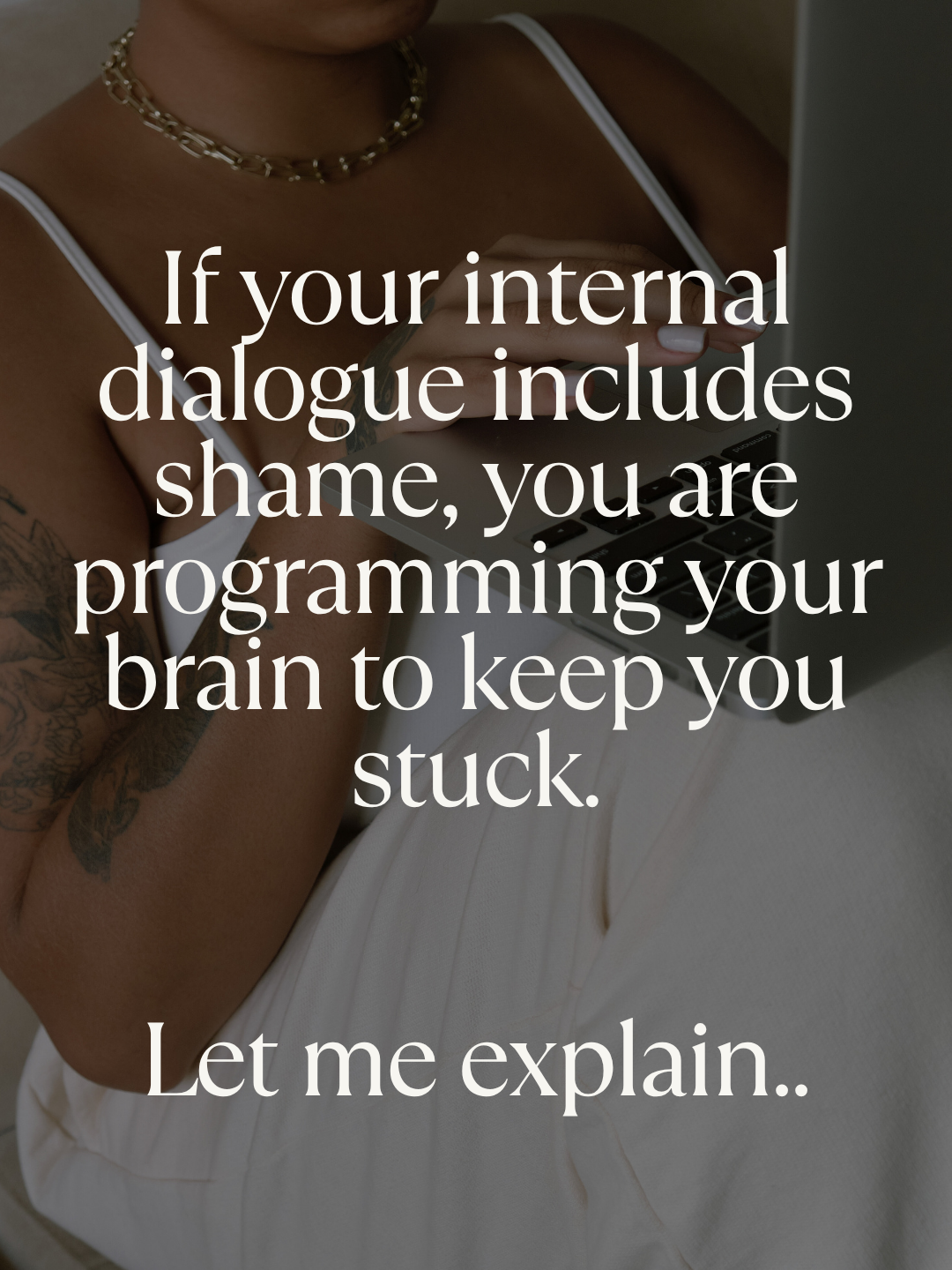 Person sitting with a laptop on their lap, wearing a white tank top and white pants, with a necklace and tattoos visible, with overlaid text about internal dialogue and shame.