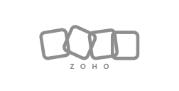 Zoho company logo with four tilted square shapes connected in a row above the text 'ZOHO'.