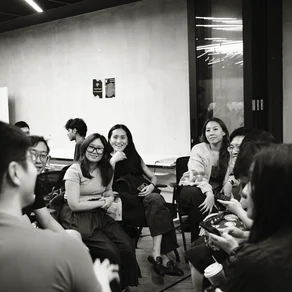 Audience laughing during an evening Hustle workshop