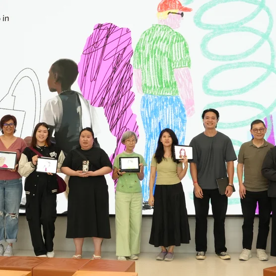 Group photo with certificates after an iPad drawing workshop