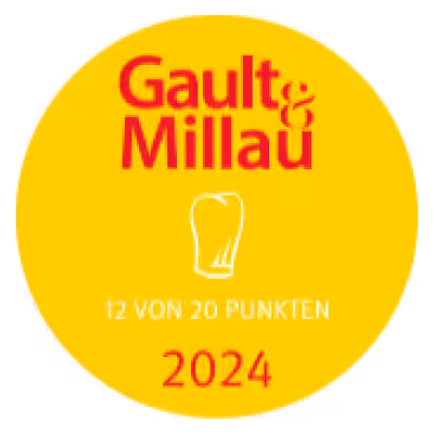 Gault&Millau Auszeichnung mit 12 von 20 Punkten und einem Kochmützen-Symbol, Jahr 2024.