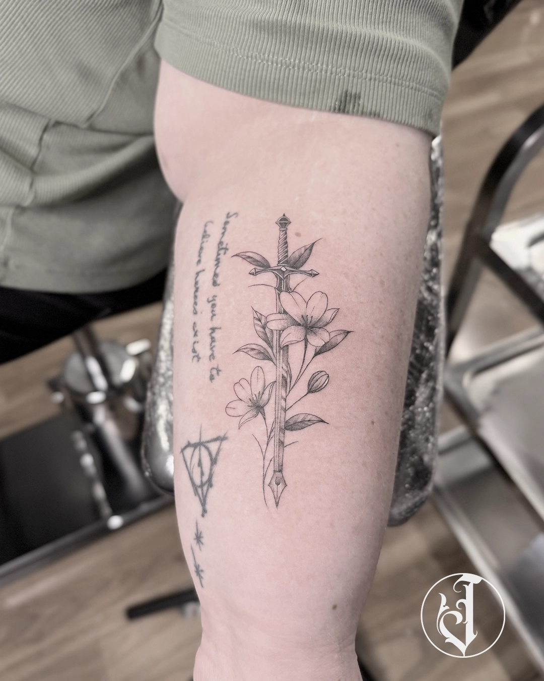 Dagger and flower tattoo used to explain traditional subject matter