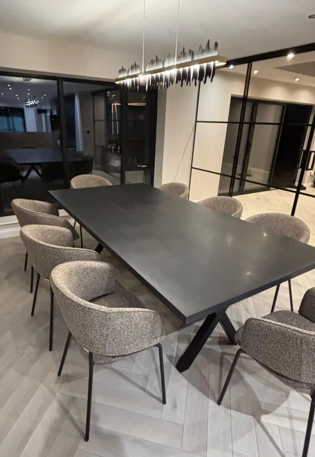 Custom made slimline black polished concrete dining table by RockVine