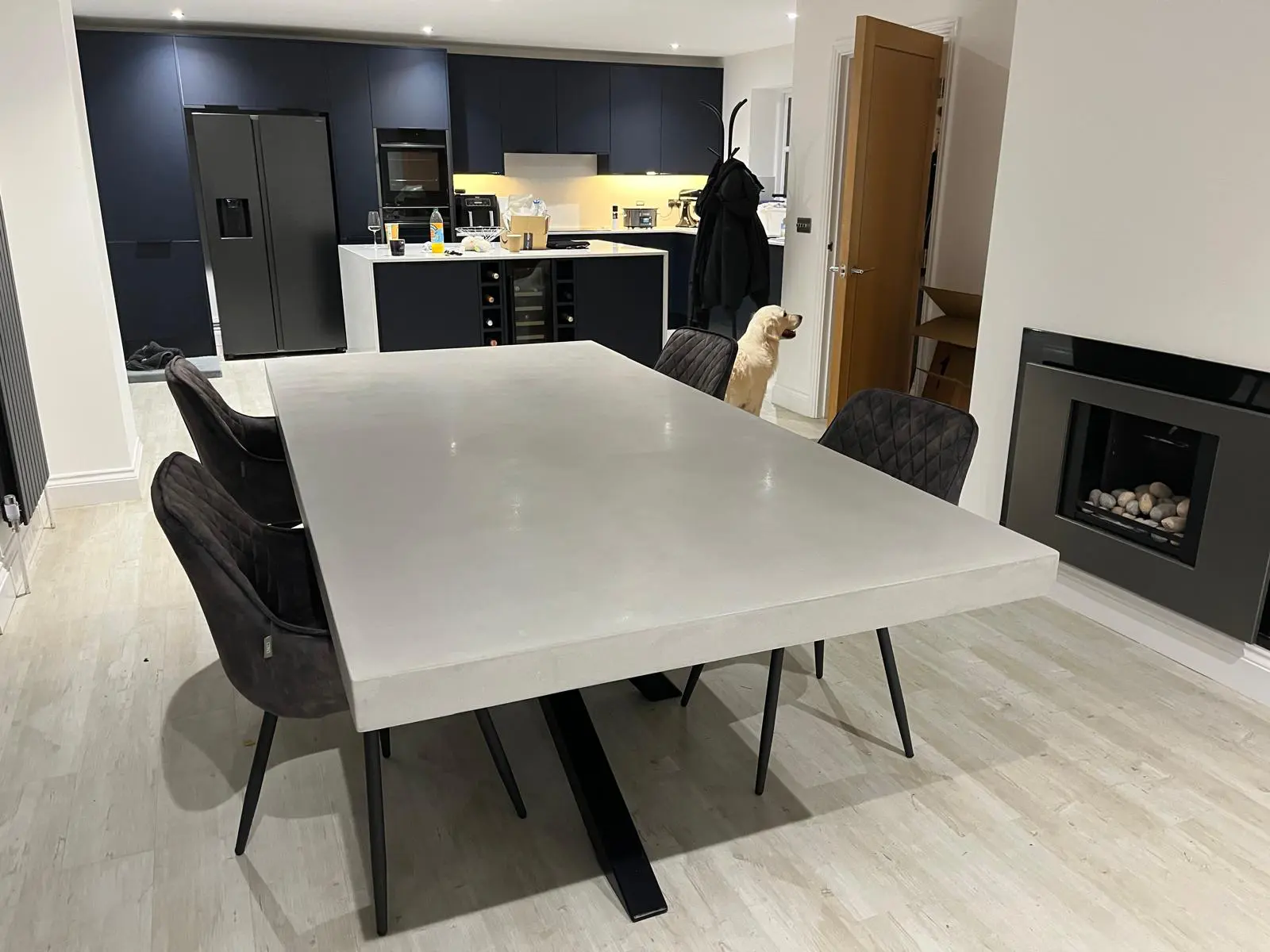 Polished concrete dining table in light grey by RockViner