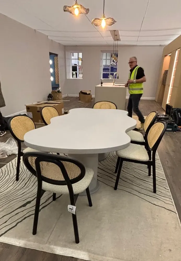 Cloud polished concrete dining table being installed at Grand Designs House, RockVine