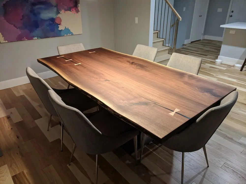 Contemporary live edge dining table with bow ties
