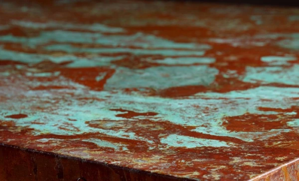 Copper patinated concrete table finish by RockVine