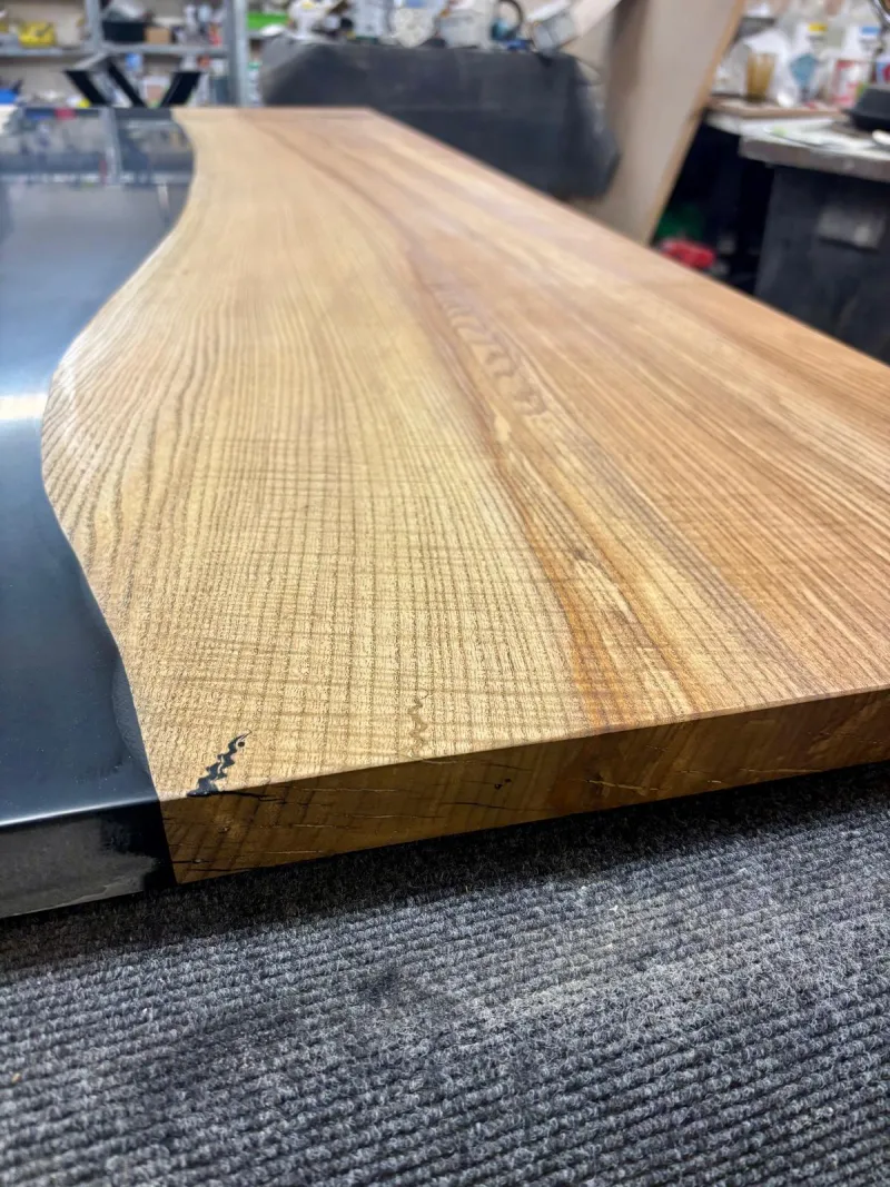 Close up of commercial resin river oak workstation in production