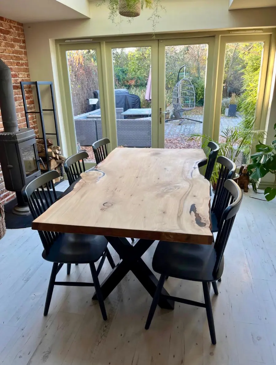 Live edge dining table with steel base
