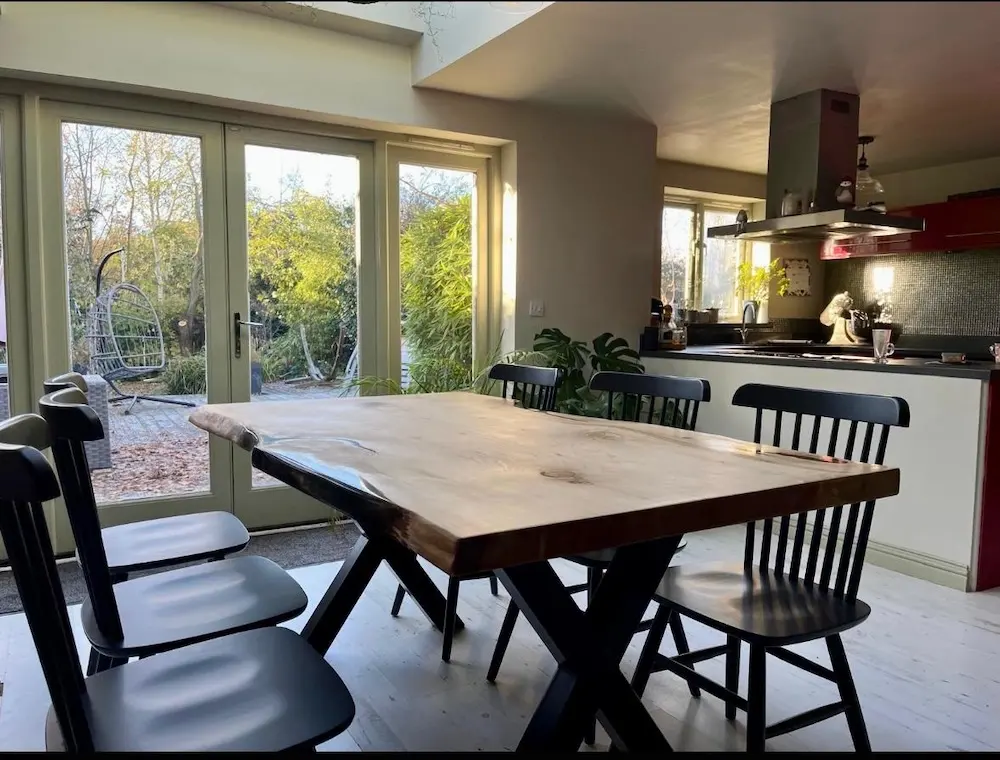 Partners reviewing design plans for a bespoke furniture project