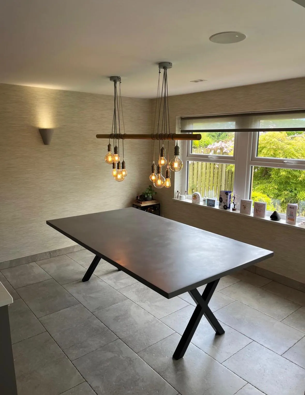 Slimline mid grey polished concrete dining table on X-style base
