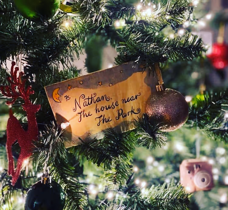 Leigh Roberts Christmas letter on the tree