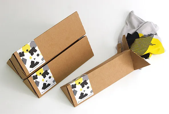 Packaging clothes the old same way but with a twist, still environmental and protected but different