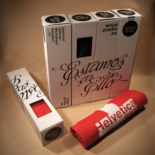 Packaging with glimpse of the clothing items inside.